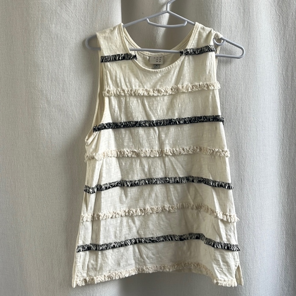 White tank with tassel detail